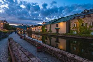 night scene of the Canal at Otaru port town in Hokkaido, Japan photo