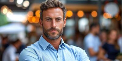 ai generado retrato de un hermoso hombre en un azul camisa a un al aire libre café foto