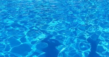 Water in swimming pool rippled photo