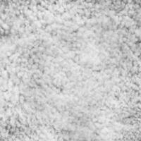 Background picture of a soft fur white carpet photo