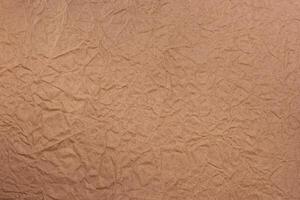 Brown crumpled paper, for backgrounds or textures photo