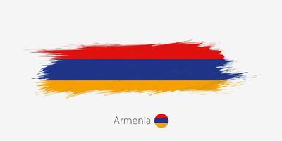 Flag of Armenia, grunge abstract brush stroke on gray background. vector