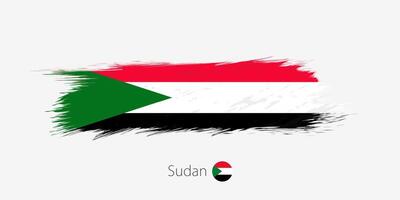 Flag of Sudan, grunge abstract brush stroke on gray background. vector