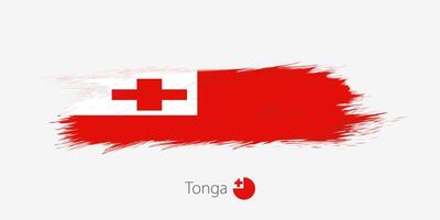 Flag of Tonga, grunge abstract brush stroke on gray background. vector