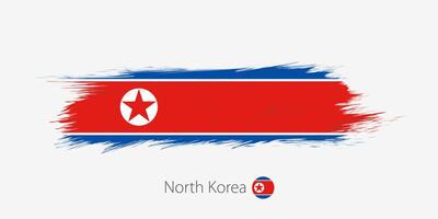 Flag of North Korea, grunge abstract brush stroke on gray background. vector