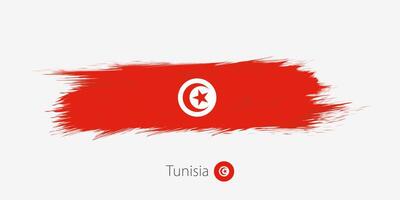 Flag of Tunisia, grunge abstract brush stroke on gray background. vector