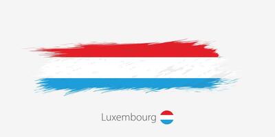 Flag of Luxembourg, grunge abstract brush stroke on gray background. vector