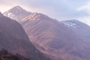 The beautiful mountains in the Scottish Highlands. Glenfinnan, Scotland. photo