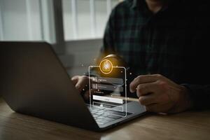 Businessman using mobile phone and laptop login to access, information security and encryption, secure access user's information, Internet access, cybersecurity. Cyber security technology concept. photo