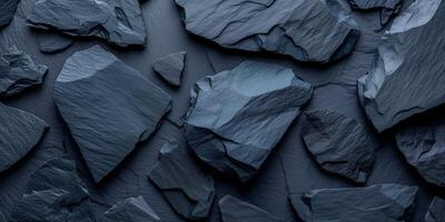 AI generated Close-up texture of dark slate stone pieces with natural patterns photo