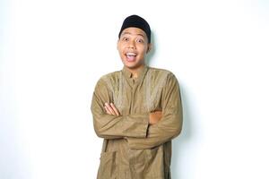 asian muslim man crossed hand looks surprised isolated on white background photo