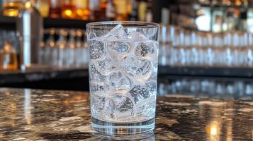 AI generated Refreshing glass of sparkling water with ice on bar counter photo