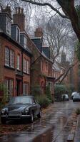 AI generated Vintage car parked on wet cobblestone street by brick houses on foggy day photo