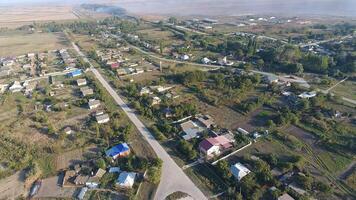 View from the top of the village. Houses and gardens. Countryside, rustic landscape. Aerial photography photo