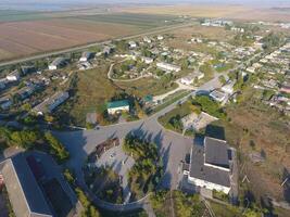 View from the top of the village. Houses and gardens. Countryside, rustic landscape. Aerial photography photo