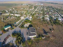 View from the top of the village. Houses and gardens. Countryside, rustic landscape. Aerial photography photo