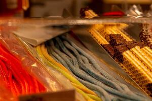 a candy stand at a market photo