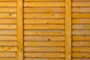 a wooden fence with boards photo