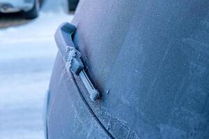 frozen rear window wiper from a car photo