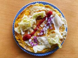 Homemade Indian Style Egg Rolls With Salad on top as filling photo