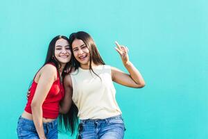 Latin American female smiling and happy looking at the camera. photo