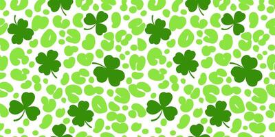 Clover leaves seamless pattern. Shamrock vector background for Irish St. Patrick Day. Spring holiday illustration with green trefoils on white background with leopard cheetah backdrop