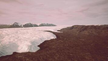 A breathtaking glacier surrounded by majestic mountains video