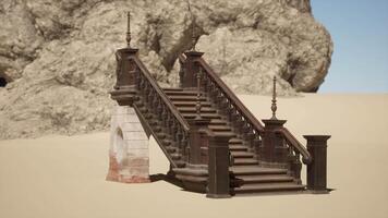 A set of stairs in the sand with a rock in the background video