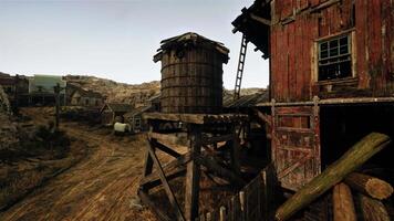 A wooden building with a water tower next to it video