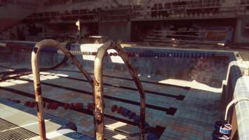 An abandoned swimming pool devoid of any swimmers or activity video