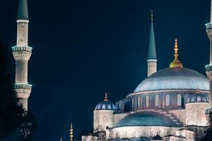 Sultanahmet Camii or the Blue Mosque at night. Islamic or ramadan background photo