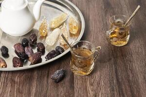 Delicious tea with dates photo