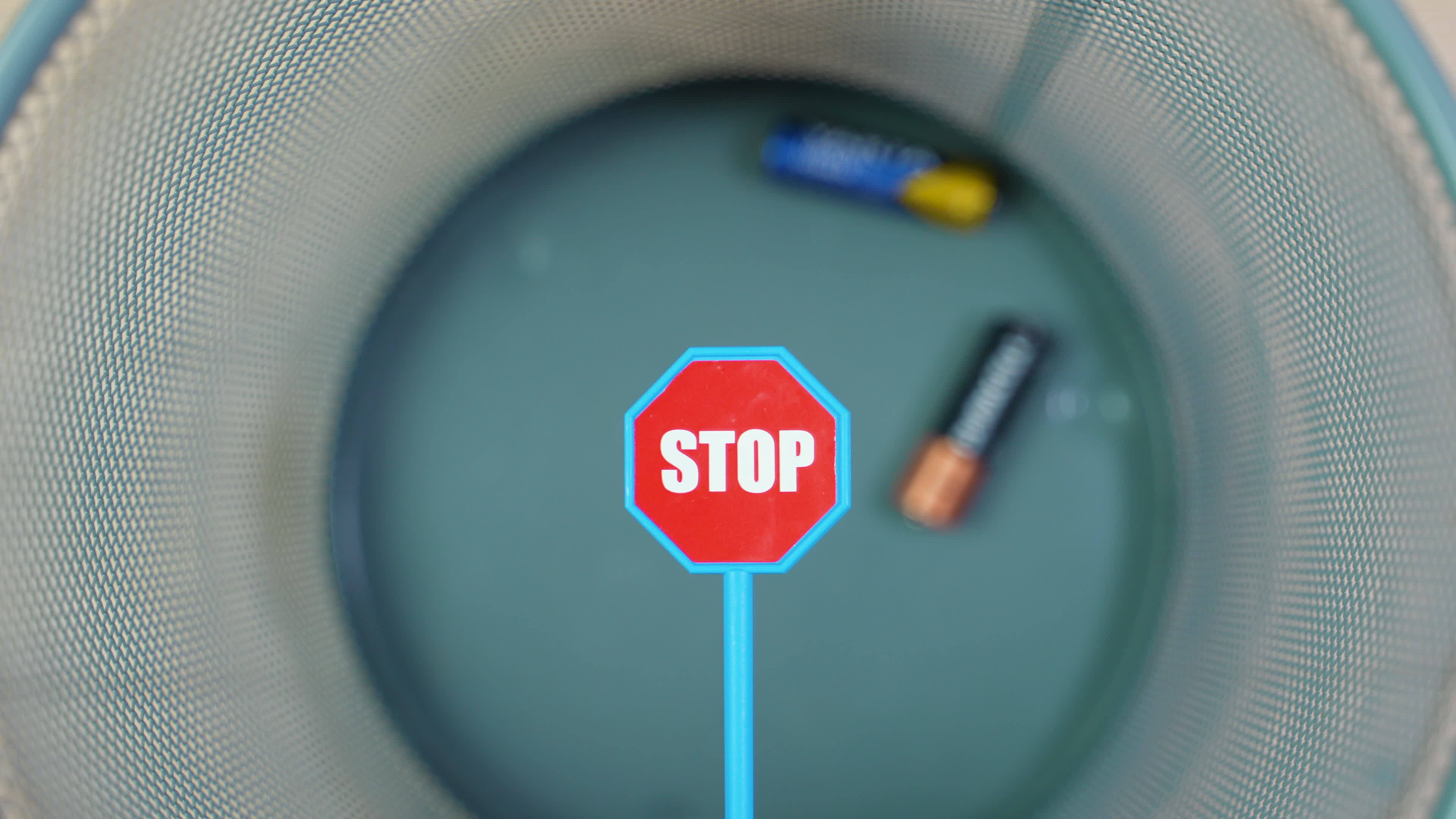 Throw used batteries into the trash. Overflowing used batteries in