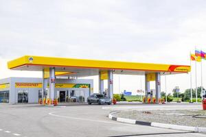 Russia, Novorossiysk 2021.  Rosneft gas station on the suburban highway. photo