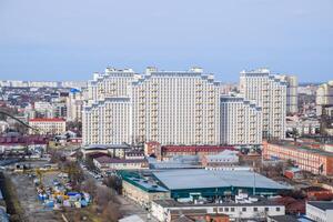 Russia, Krasnodar 2021. City landscape. The view from the heights of the 24th floor. Krasnodar city. Urban view. photo