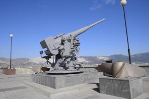 Russia, Novorossiysk 2021. Artillery battle cannon, raised from the bottom of the Black Sea. Weapons of defense in the Second World War. The restored exhibit photo