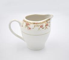 Elegant white ceramic tea coffee canisters, tea pot, coffee pot photo