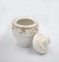 Elegant white ceramic tea coffee canisters, tea pot, coffee pot photo