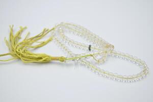 Tasbeeh with white background. Islamic concept.Muslim Prayer Beads. Islam Tasbeeh photo