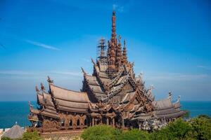 Sanctuary of Truth wooden temple in Pattaya Thailand is a gigantic wood construction located at the cape of Naklua Pattaya City. Sanctuary of Truth temple. High quality photo