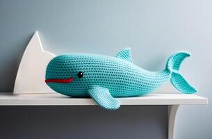 AI generated Crochet blue whale on interior shelf. Cute handmade toy. Japanese amigurumi photo