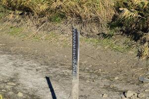 Scale measurement of level  an irrigation canal photo