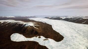 A breathtaking snow-covered mountain range seen from above video