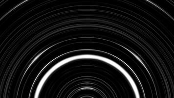 Abstract black and white circle beating on black background. Monochrome shimering curved lines moving slowly. video