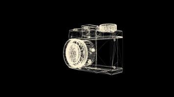 Old fashioned photo camera hologram rotating on black background. Yellow camera wireframe spinning and falling apart into the dust. video