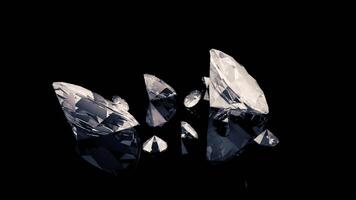 Small and big diamonds falling down to black surface, monochrome. Beautiful multifaceted crystals of different size. video