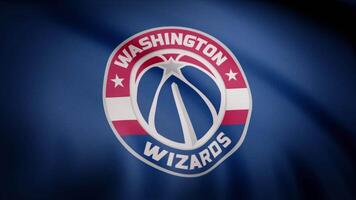 Basketball Washington Wizards flag is waving on transparent background. Close-up of waving flag with Washington Wizards basketball club logo, seamless loop. Editorial animation video