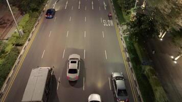 Aerial View of Traffic on a Highway. Shot. Top view from a drone of cars running on the highway at the night video