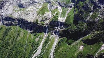 Flight over the Altai mountains. Stunning waterfall aerial view. Waterfall flows into the river video