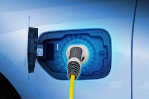 Power cable pump plug in charging power to electric vehicle EV car. photo